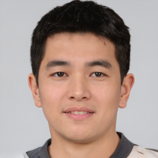 Neutral asian young-adult male with short  brown hair and brown eyes