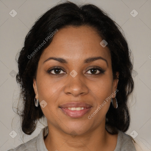 Joyful black adult female with medium  brown hair and brown eyes