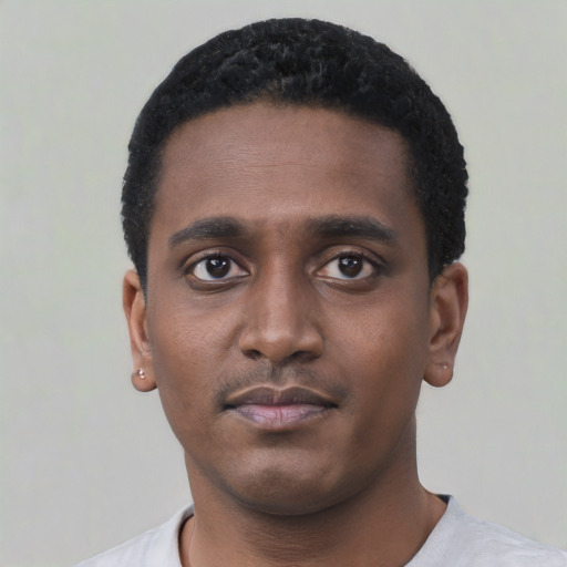 Neutral black young-adult male with short  black hair and brown eyes