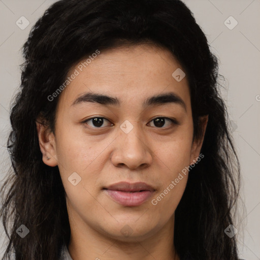 Joyful latino young-adult female with long  brown hair and brown eyes