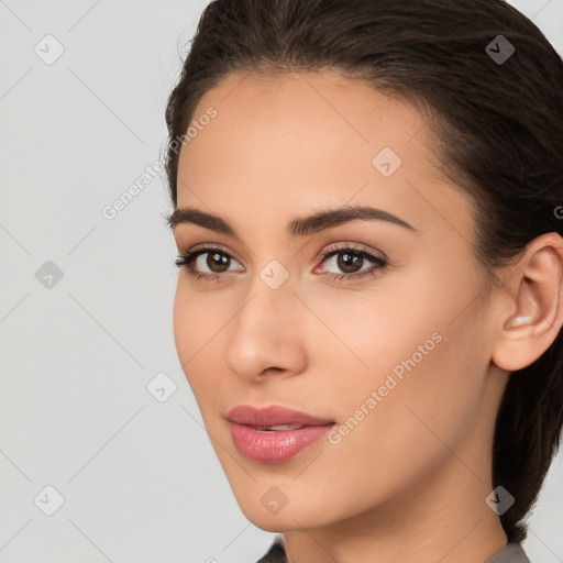 Neutral white young-adult female with long  brown hair and brown eyes