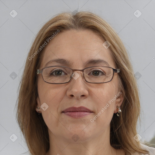 Joyful white adult female with medium  brown hair and grey eyes