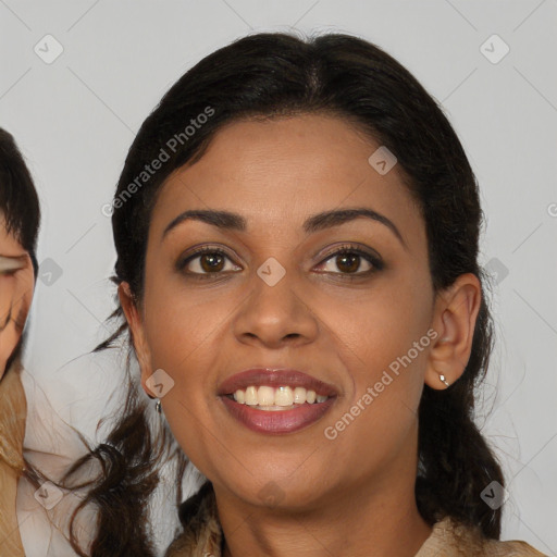 Joyful black young-adult female with medium  brown hair and brown eyes