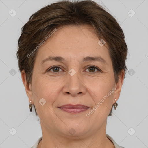 Joyful white adult female with short  brown hair and brown eyes