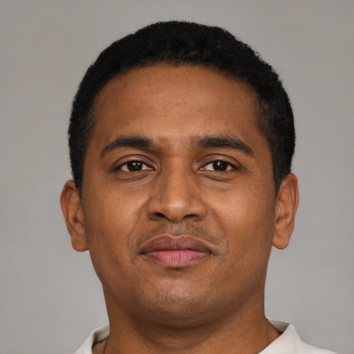 Neutral latino young-adult male with short  black hair and brown eyes
