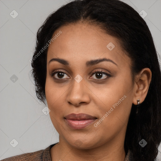 Joyful latino young-adult female with long  brown hair and brown eyes