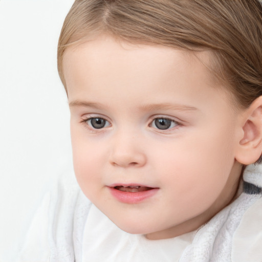 Joyful white child female with short  brown hair and brown eyes