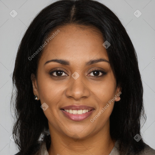Joyful black young-adult female with long  black hair and brown eyes
