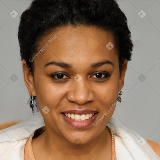 Joyful black young-adult female with short  brown hair and brown eyes