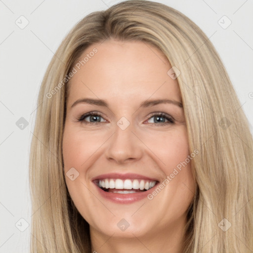 Joyful white young-adult female with long  brown hair and brown eyes