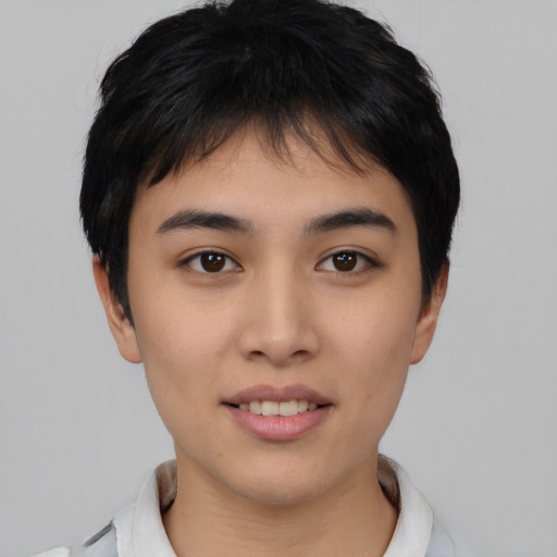 Joyful asian young-adult female with short  black hair and brown eyes