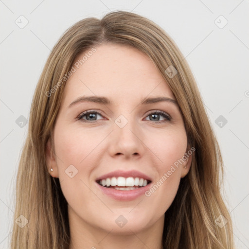 Joyful white young-adult female with long  brown hair and green eyes