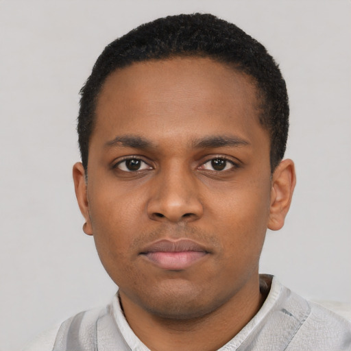 Neutral black young-adult male with short  black hair and brown eyes