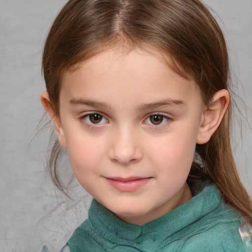 Joyful white child female with medium  brown hair and brown eyes