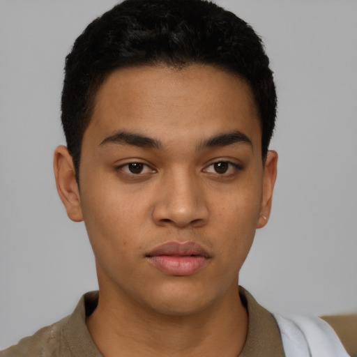 Neutral latino young-adult male with short  brown hair and brown eyes