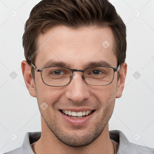 Joyful white young-adult male with short  brown hair and grey eyes