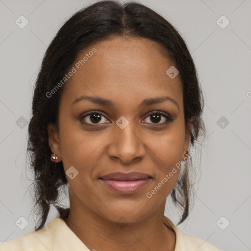 Joyful black young-adult female with medium  brown hair and brown eyes