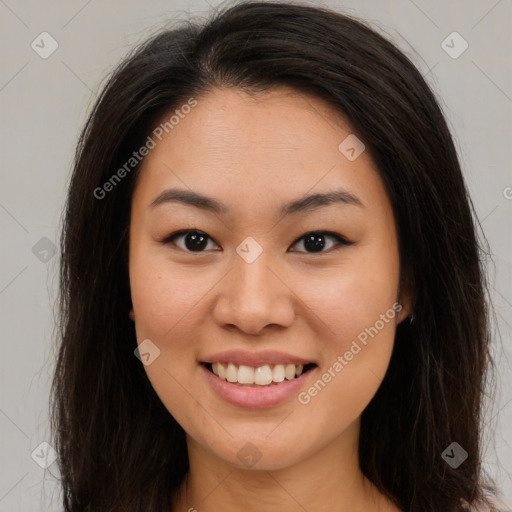 Joyful white young-adult female with long  brown hair and brown eyes