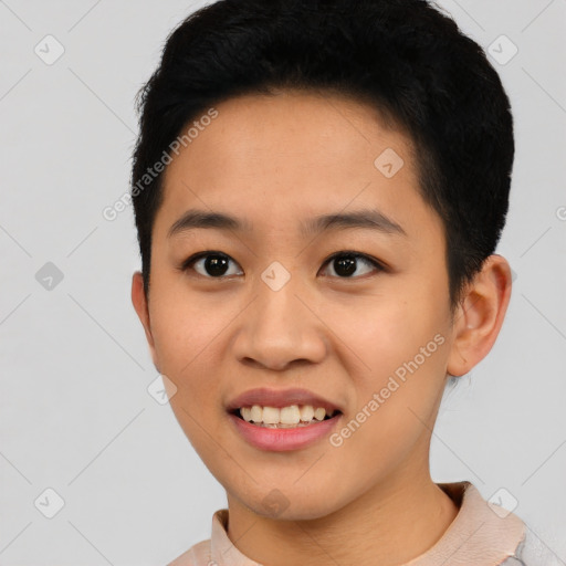 Joyful asian young-adult female with short  black hair and brown eyes