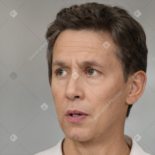 Neutral white adult male with short  brown hair and brown eyes