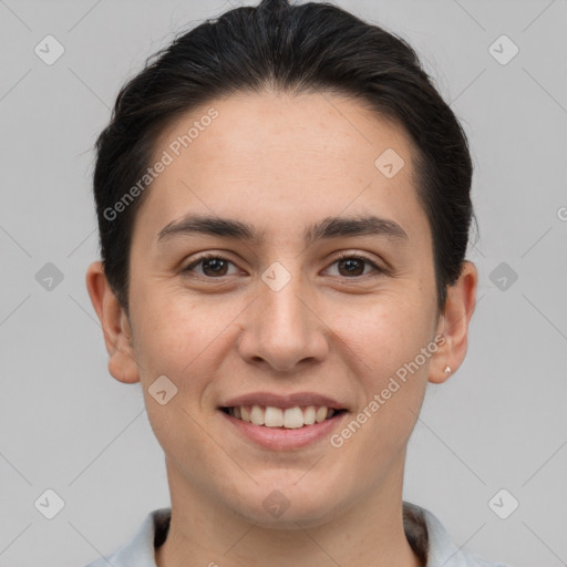 Joyful white young-adult female with short  brown hair and brown eyes