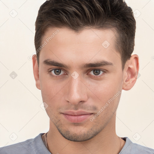 Neutral white young-adult male with short  brown hair and brown eyes