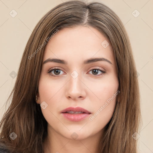 Neutral white young-adult female with long  brown hair and brown eyes