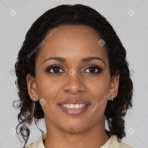 Joyful black young-adult female with medium  brown hair and brown eyes