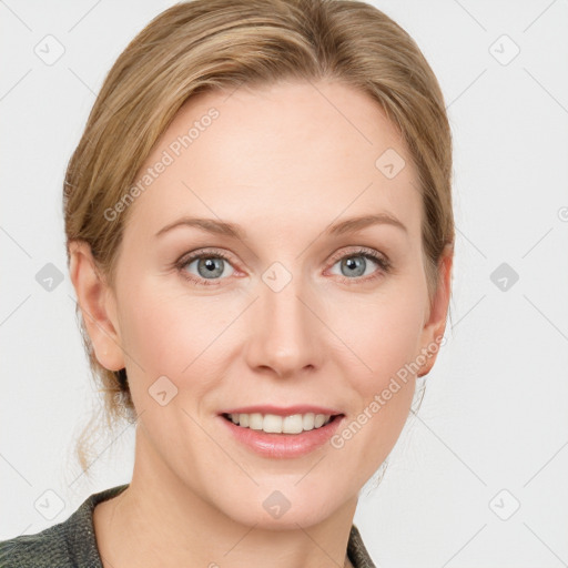 Joyful white young-adult female with medium  brown hair and blue eyes