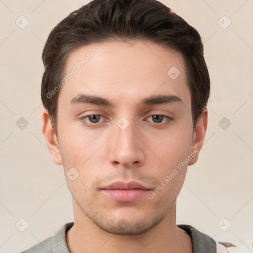 Neutral white young-adult male with short  brown hair and brown eyes