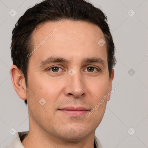 Joyful white adult male with short  brown hair and brown eyes