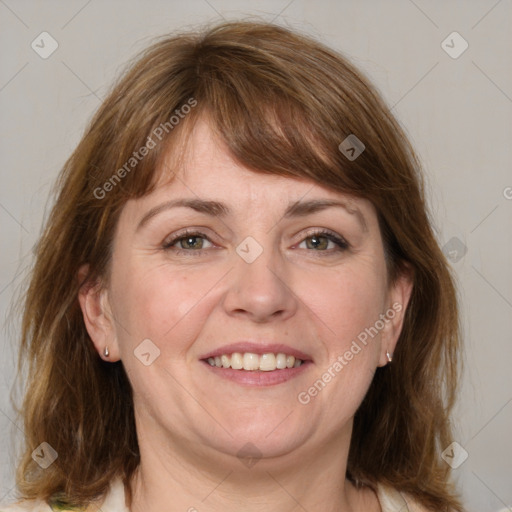 Joyful white adult female with medium  brown hair and grey eyes