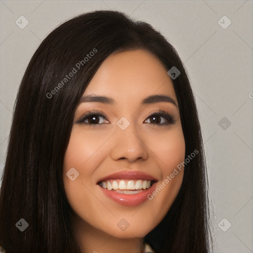 Joyful latino young-adult female with long  black hair and brown eyes