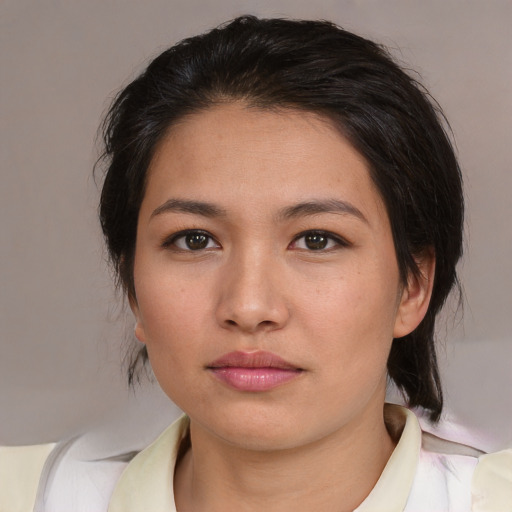Neutral latino young-adult female with medium  brown hair and brown eyes