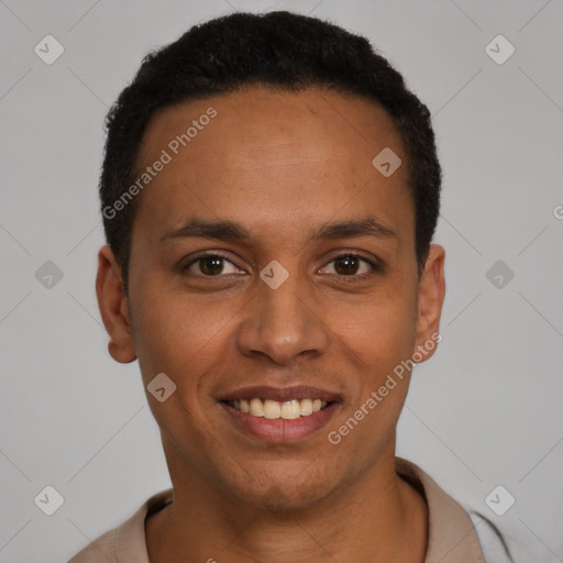 Joyful latino young-adult male with short  black hair and brown eyes