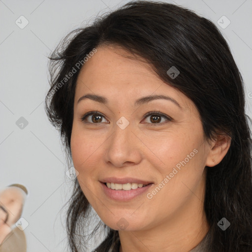 Joyful white adult female with medium  brown hair and brown eyes