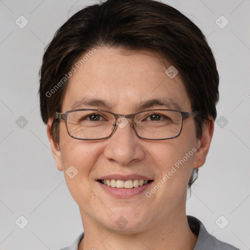 Joyful white adult female with short  brown hair and brown eyes