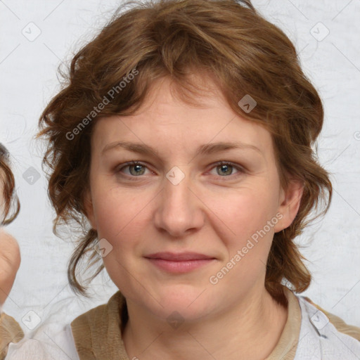 Joyful white young-adult female with medium  brown hair and blue eyes