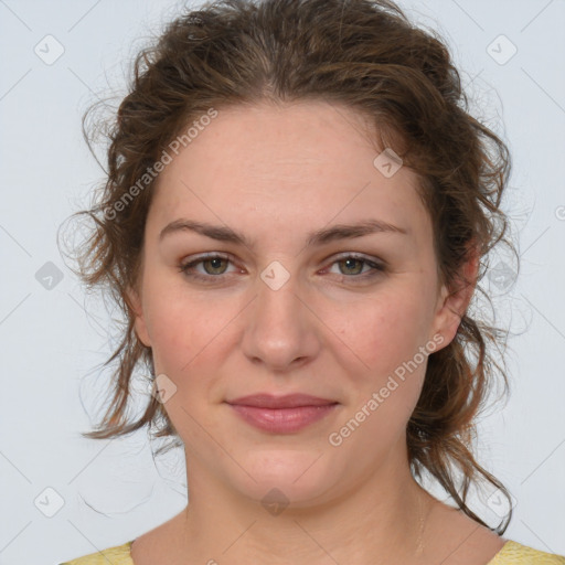 Joyful white young-adult female with medium  brown hair and green eyes