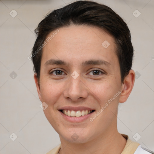 Joyful white young-adult female with short  brown hair and brown eyes