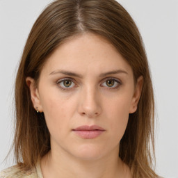 Neutral white young-adult female with medium  brown hair and brown eyes