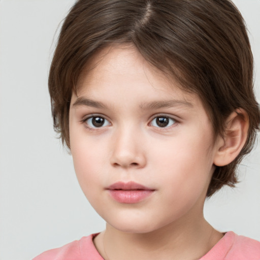 Neutral white child female with medium  brown hair and brown eyes