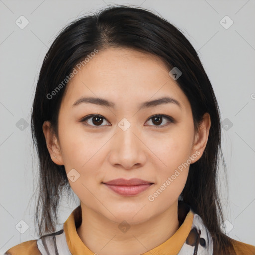 Joyful latino young-adult female with medium  brown hair and brown eyes