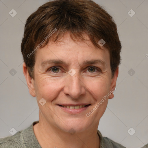 Joyful white adult male with short  brown hair and grey eyes