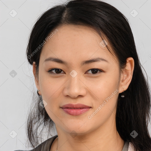 Joyful asian young-adult female with long  brown hair and brown eyes