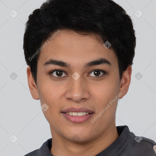 Joyful latino young-adult male with short  brown hair and brown eyes