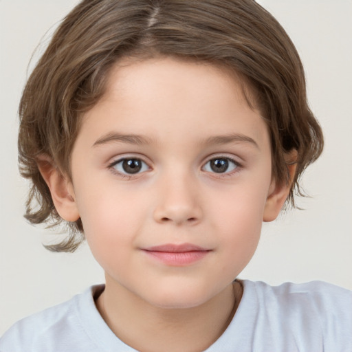 Joyful white child female with short  brown hair and brown eyes