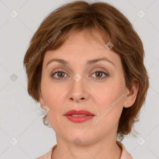 Joyful white adult female with medium  brown hair and grey eyes