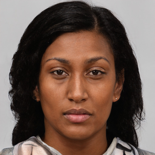 Neutral latino young-adult female with medium  black hair and brown eyes