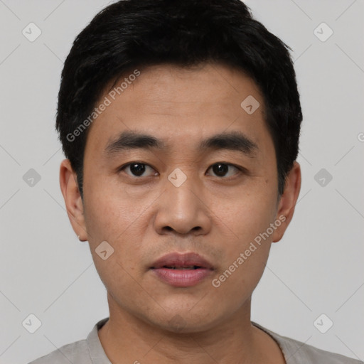 Neutral asian young-adult male with short  black hair and brown eyes